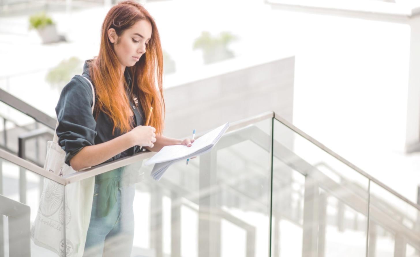 Financial documents and calculator showing budget planning